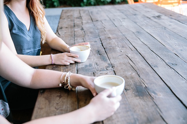 An image of two woman having coffee